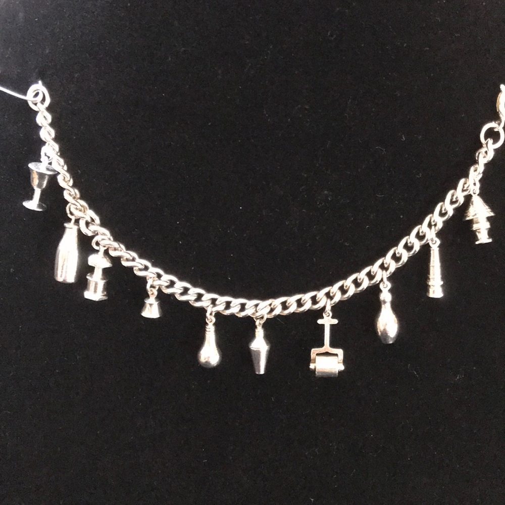 Silver tone silver vintage charm bracelet